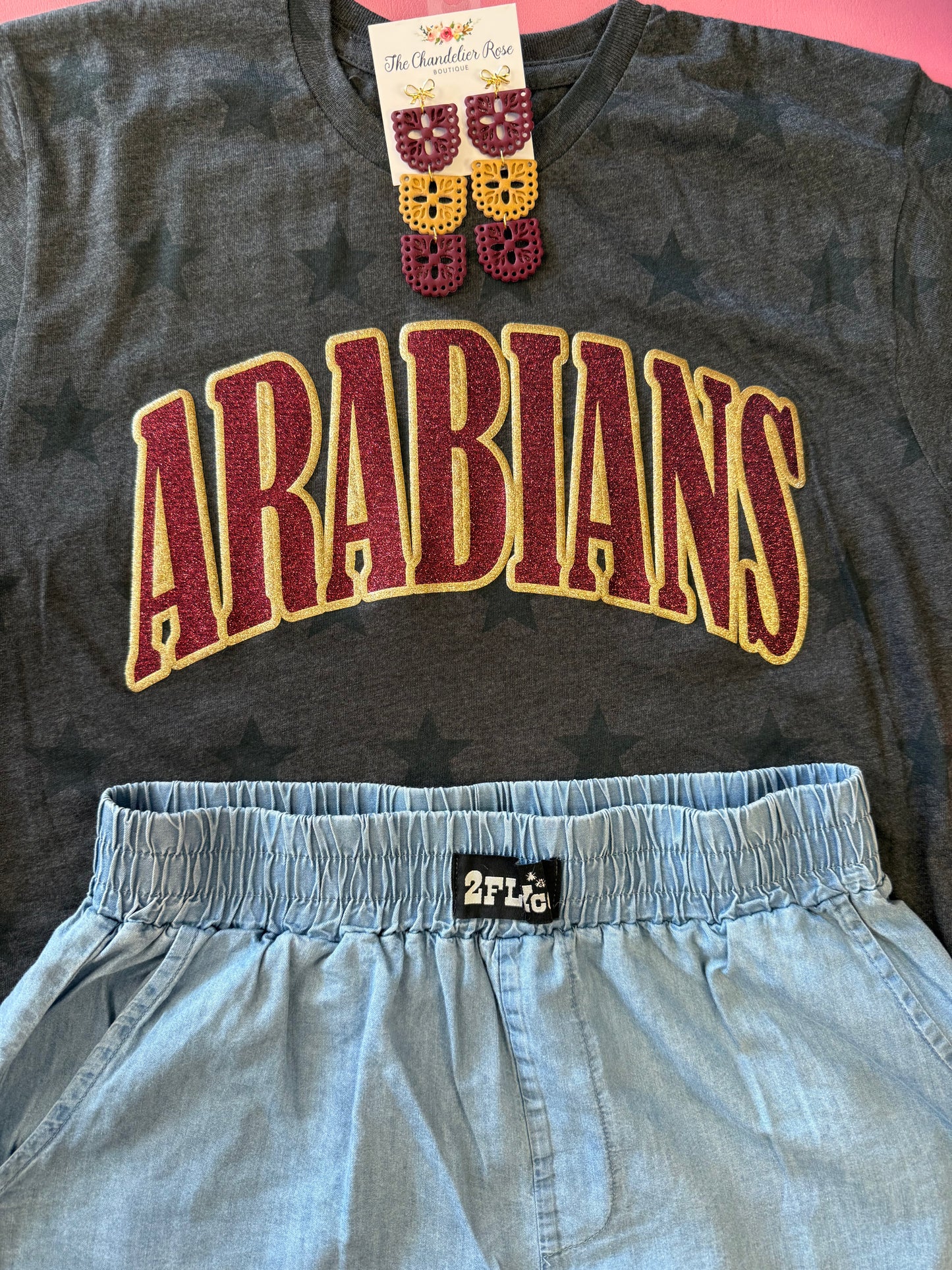 ARCHED ARABIANS SMOKE STARS GAME DAY CHARCOAL BLACK TEE - MAROON/GOLD GLITTER PUFF