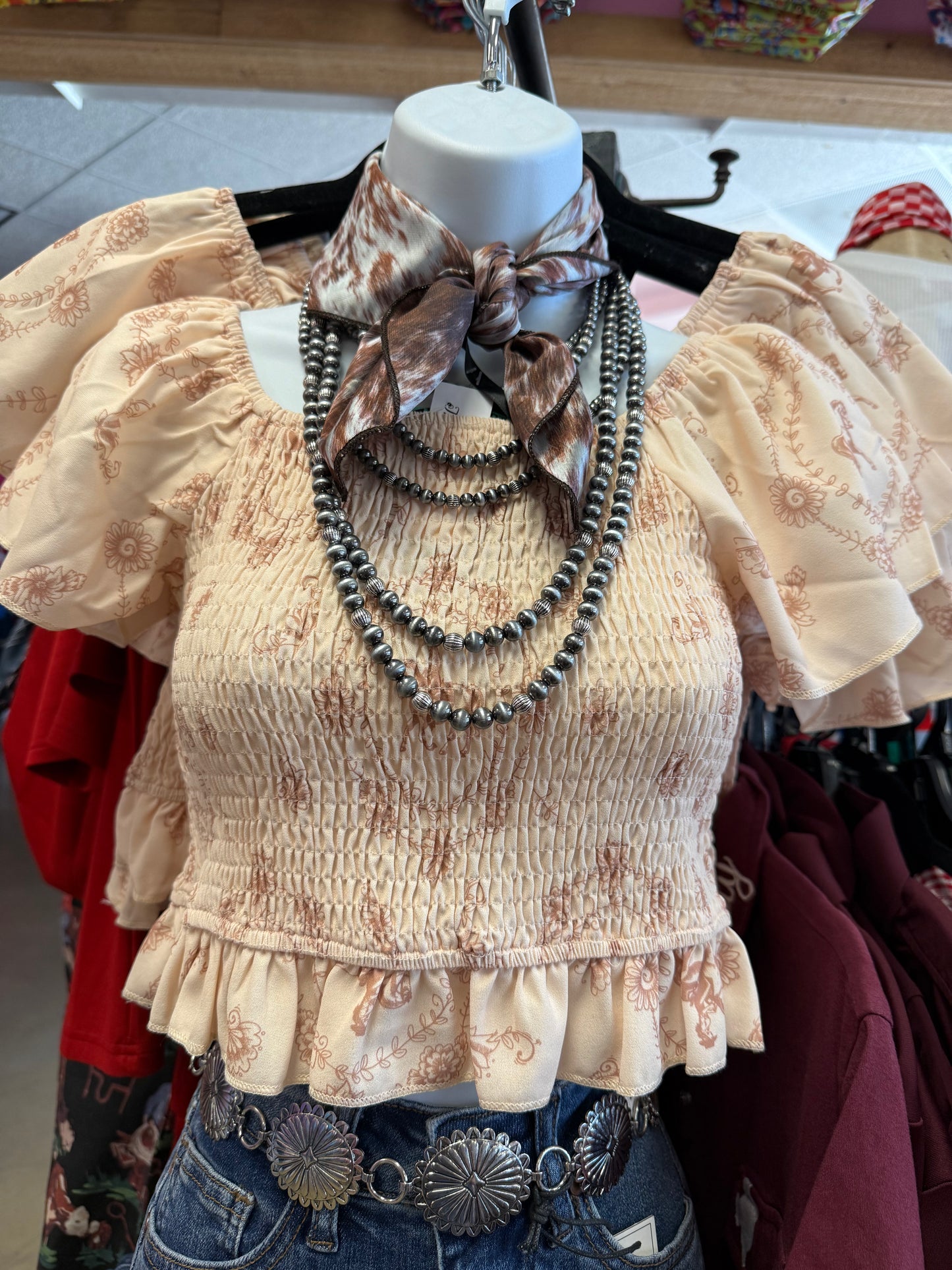 CREAM HORSE PRINTED WESTERN RUFFLE SMOCKED TOP