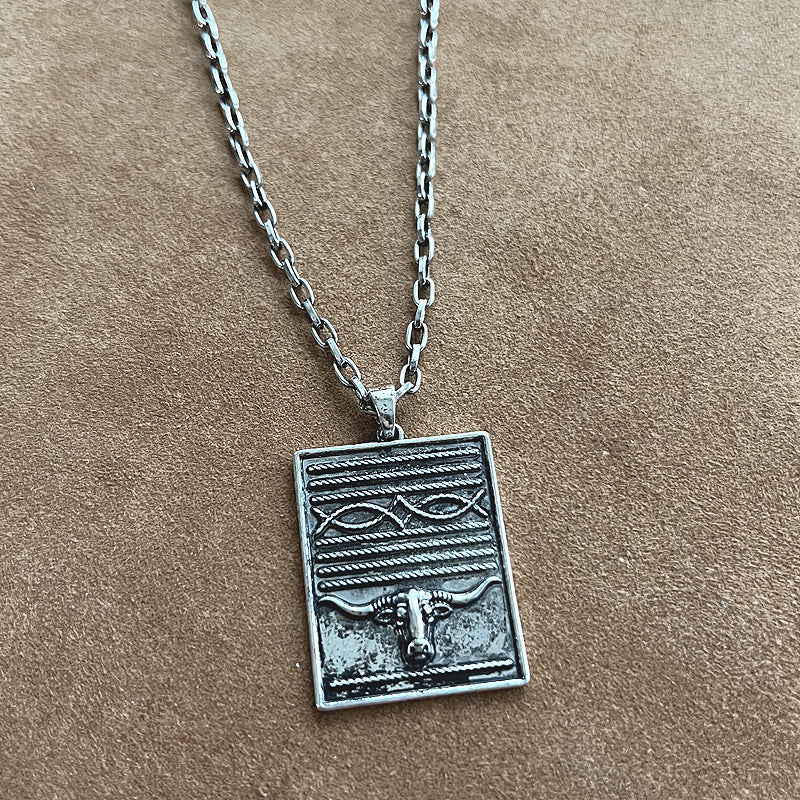 WESTERN BOOT STITCH COW NECKLACE