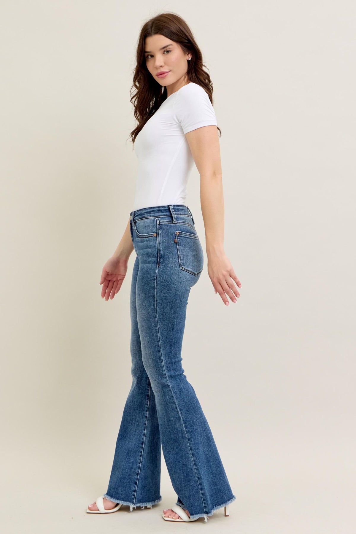 JUDY BLUE MID RISE VINTAGE WASH FLARE WITH DESTROY AND FAY HEM JEANS - MEDIUM STONE