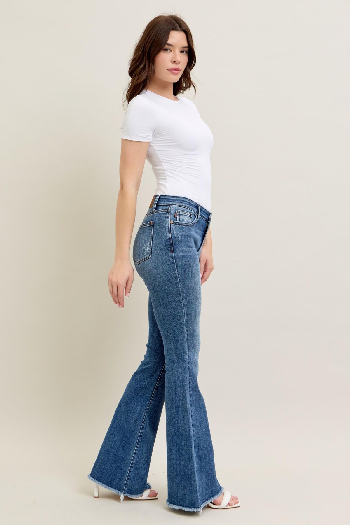 JUDY BLUE MID RISE VINTAGE WASH FLARE WITH DESTROY AND FAY HEM JEANS - MEDIUM STONE