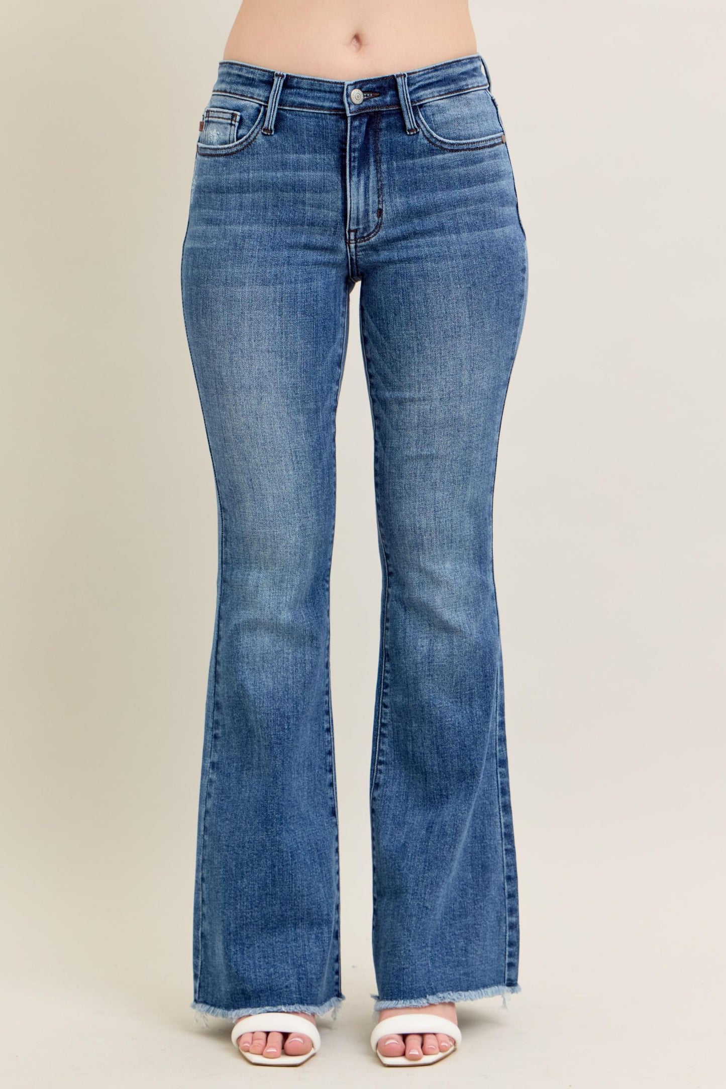 JUDY BLUE MID RISE VINTAGE WASH FLARE WITH DESTROY AND FAY HEM JEANS - MEDIUM STONE