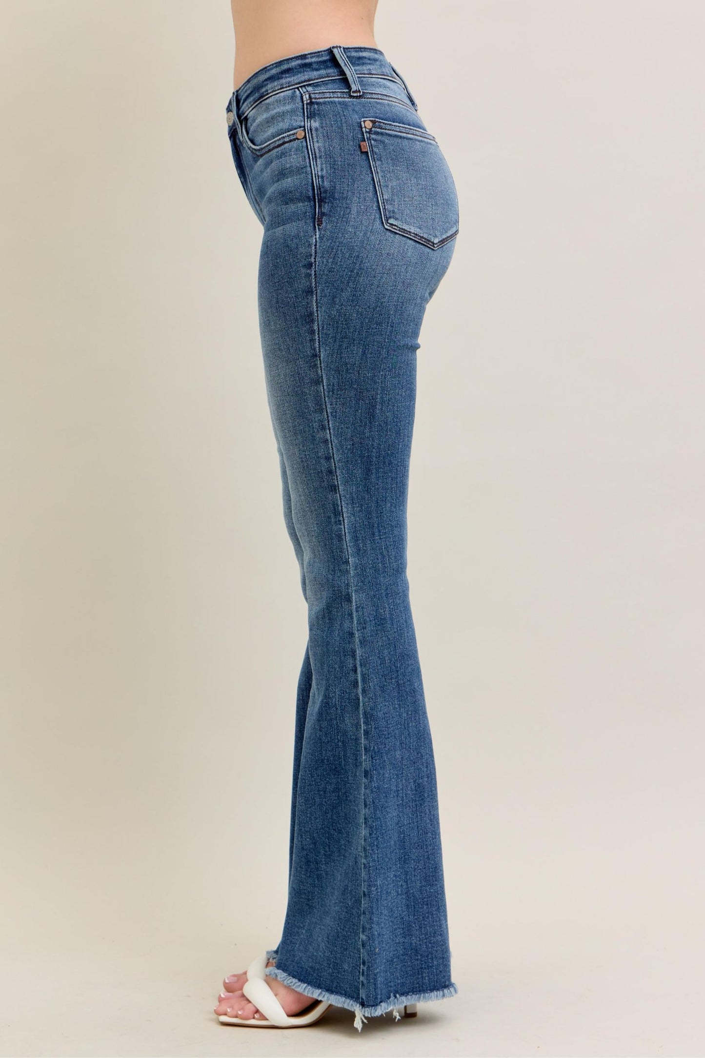 JUDY BLUE MID RISE VINTAGE WASH FLARE WITH DESTROY AND FAY HEM JEANS - MEDIUM STONE