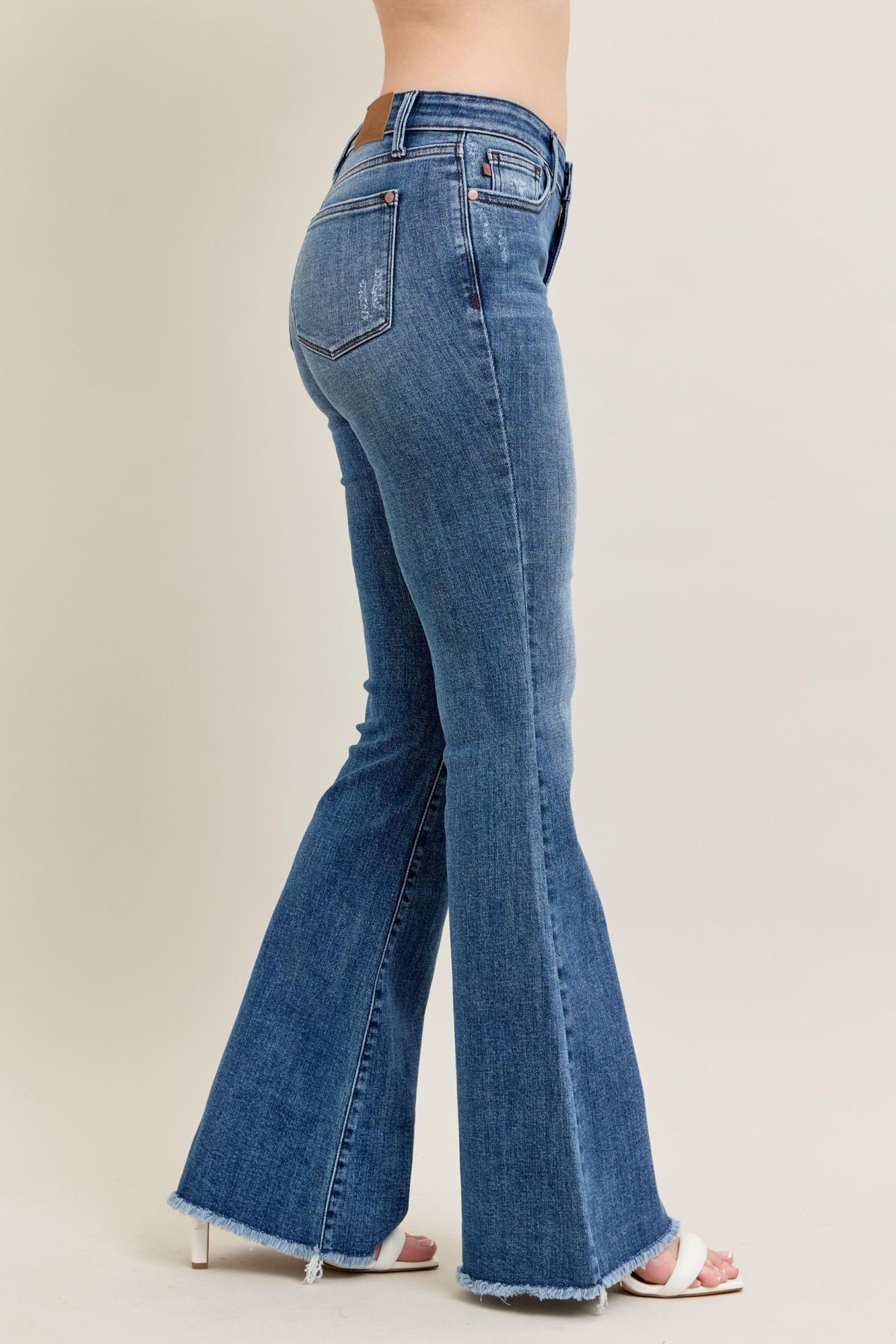 JUDY BLUE MID RISE VINTAGE WASH FLARE WITH DESTROY AND FAY HEM JEANS - MEDIUM STONE