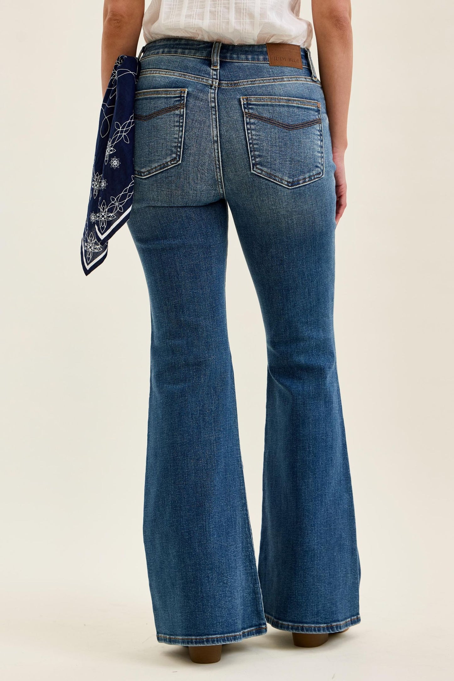 JUDY BLUE MID RISE JAQUELINE FLARE WITH TRIPLE NEED BACK POCKETS + BANDANA LOOP