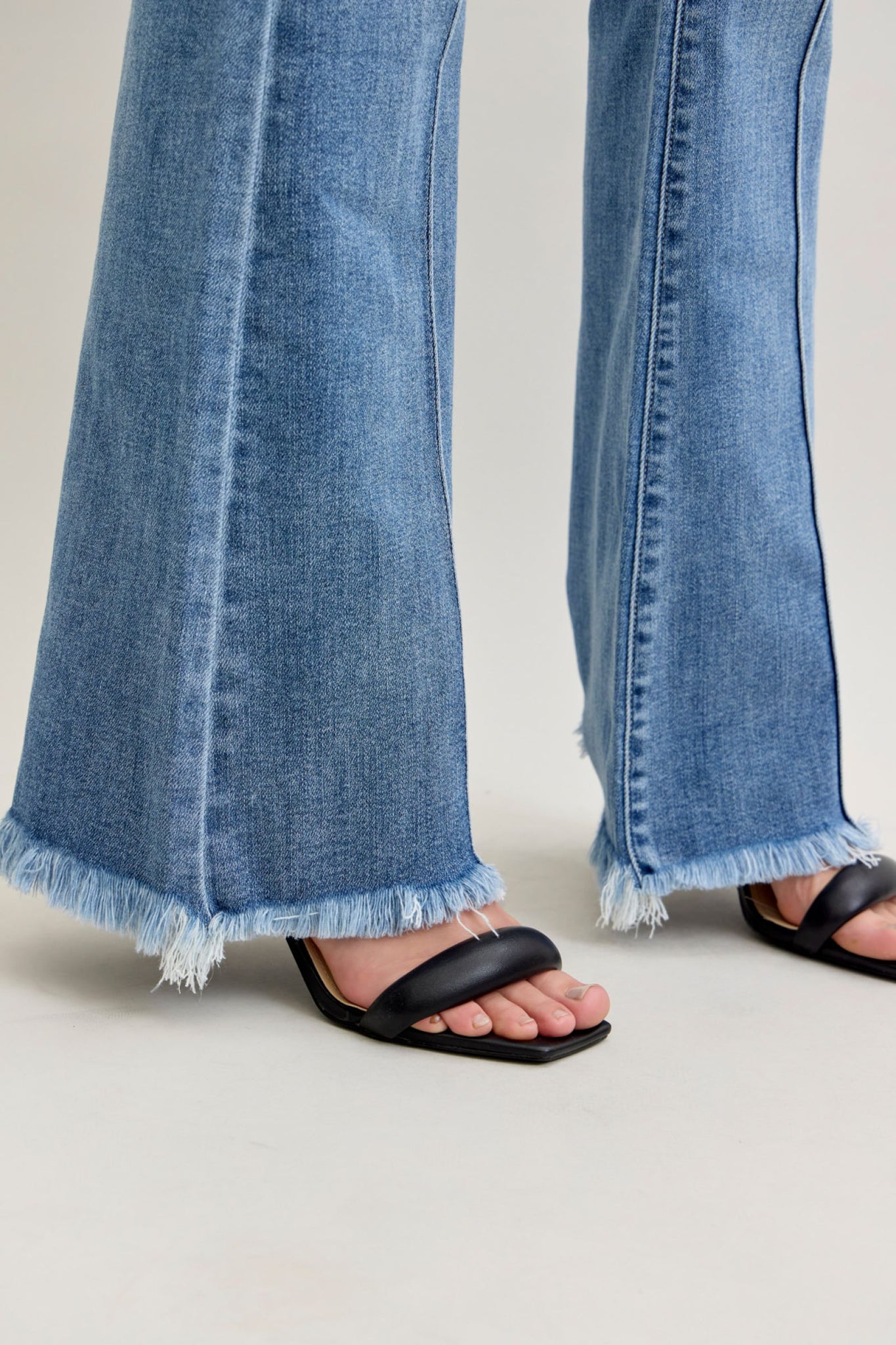JUDY BLUE HIGH WAIST FLARE FRONT PINTUCK & FRAY HEM JEANS - MEDIUM STO The Chandelier Rose Boutique JUDY BLUE HIGH WAIST FLARE FRONT PINTUCK & FRAY HEM JEANS - MEDIUM STO The Chandelier Rose Boutique
