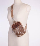 TRINITY RANCH HAIR-ON COWHIDE SLING BAG - DARK HAIR