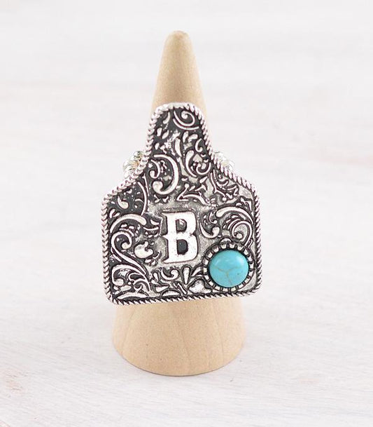 CATTLE TAG INITAL STRETCHY SILVER RING