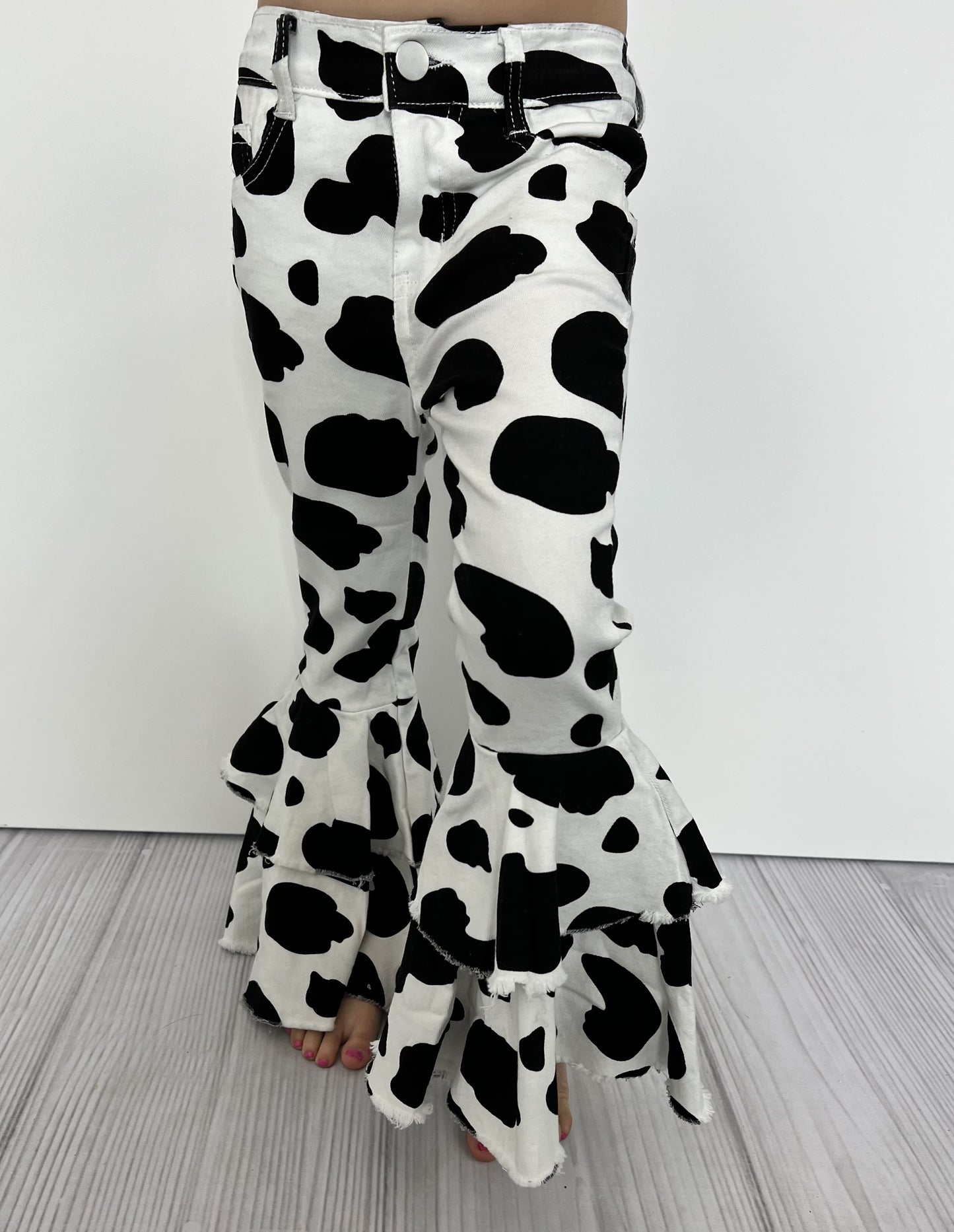 COW PRINT DENIM FLARES
