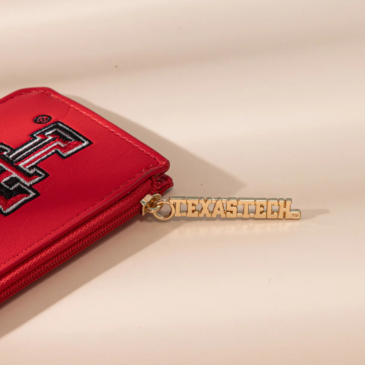 MONTANA WEST LICENSED TEXAS TECH UNIVERSITY RED RAIDERS ZIP CARD CASE - RED