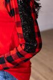 RED TOP WITH BUFFALO PLAID RAGLAN SLEEVES