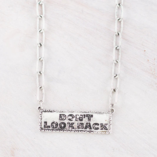 DON'T LOOK BACK SILVER NECKLACE