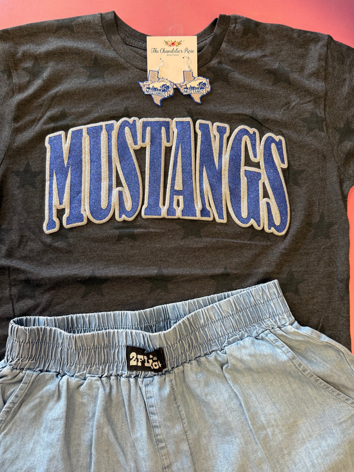 ARCHED MUSTANGS SMOKE STARS GAME DAY CHARCOAL BLACK TEE - ROYAL BLUE/SILVER GLITTER PUFF