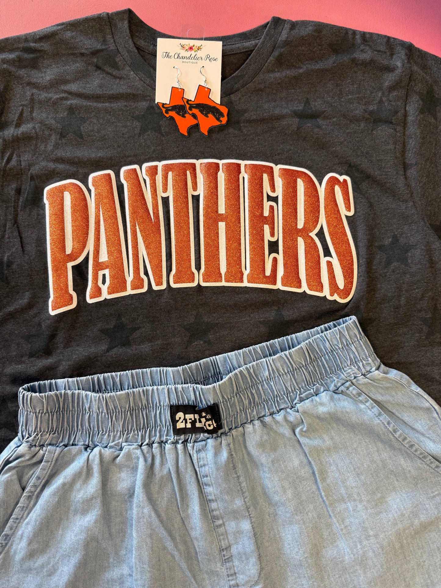 ARCHED PANTHERS SMOKE STARS GAME DAY CHARCOAL BLACK TEE - ORANGE/WHITE GLITTER PUFF