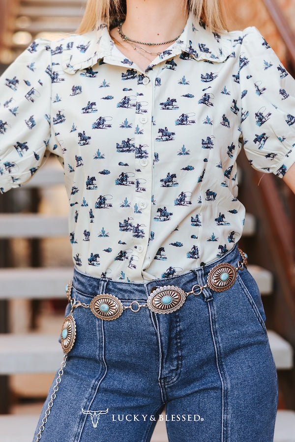 CREAM TEAL COWBOY PRINTED BUTTON DOWN PUFF SHORT SLEEVE TOP