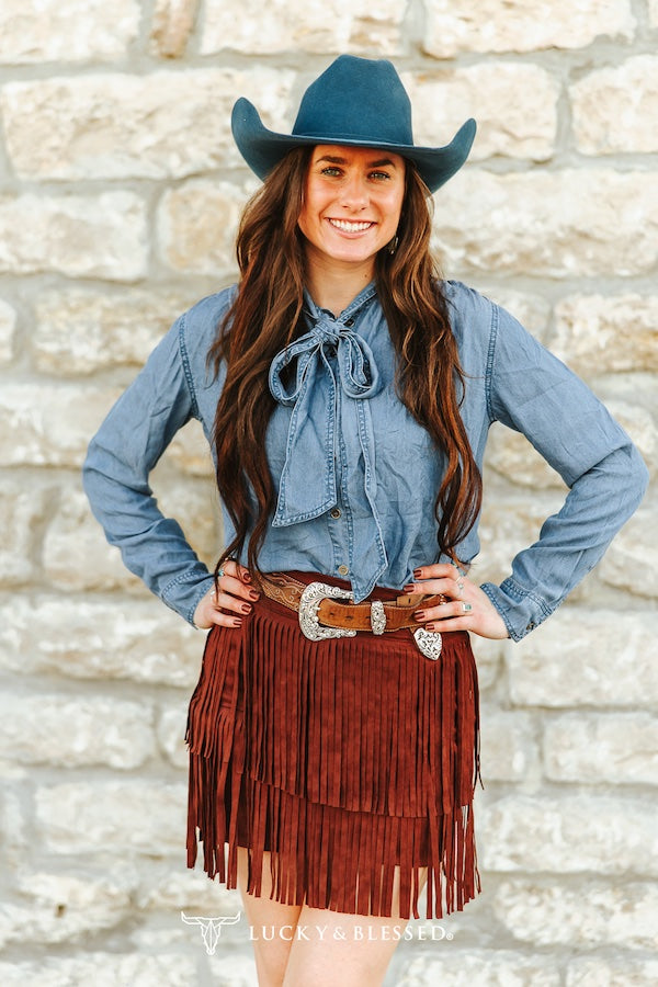 MID WASH TENCEL DENIM CONCHO BUTTON DOWN BOW DENIM BLOUSE