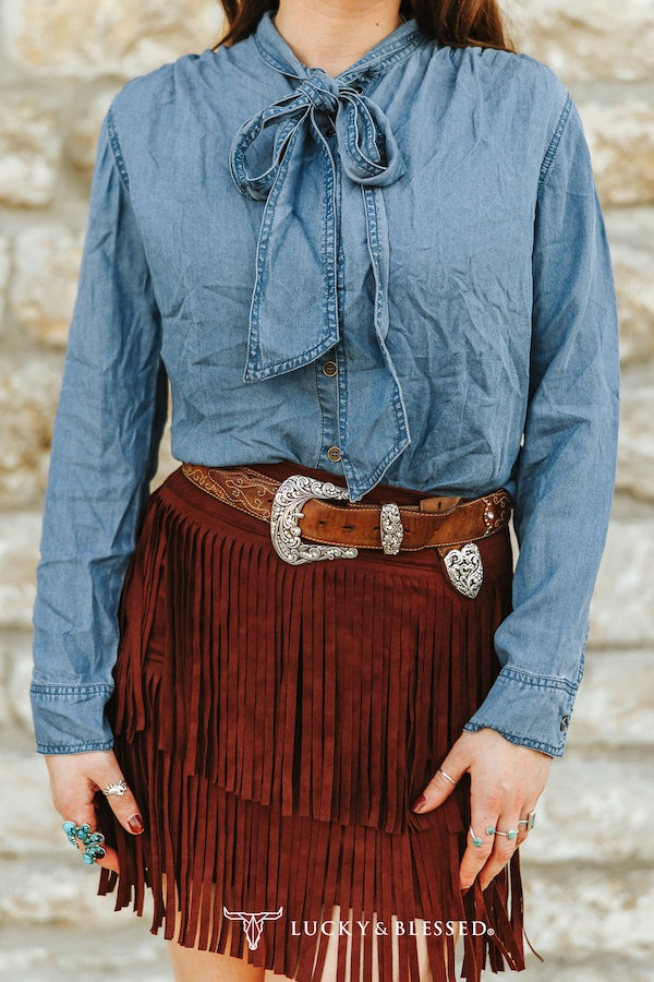 MID WASH TENCEL DENIM CONCHO BUTTON DOWN BOW DENIM BLOUSE