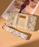 WRANGLER PAISLEY PRINT WRISTLET WALLET - TAN