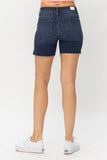 JUDY BLUE MID RISE MID LENGTH CUT OFF DARK JEAN SHORTS